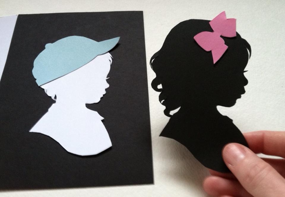 boy and girl silhouettes by Kathryn Flocken